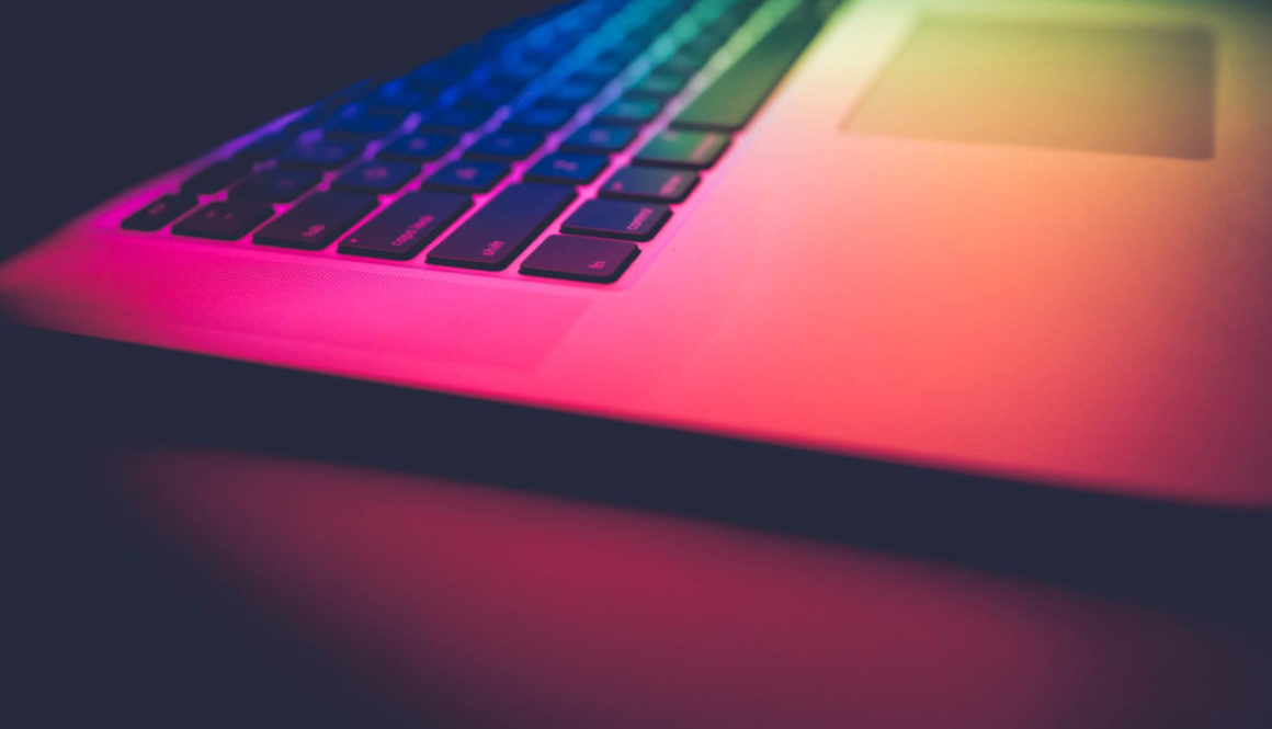 rainbow lights on laptop, effective design, simplistic
